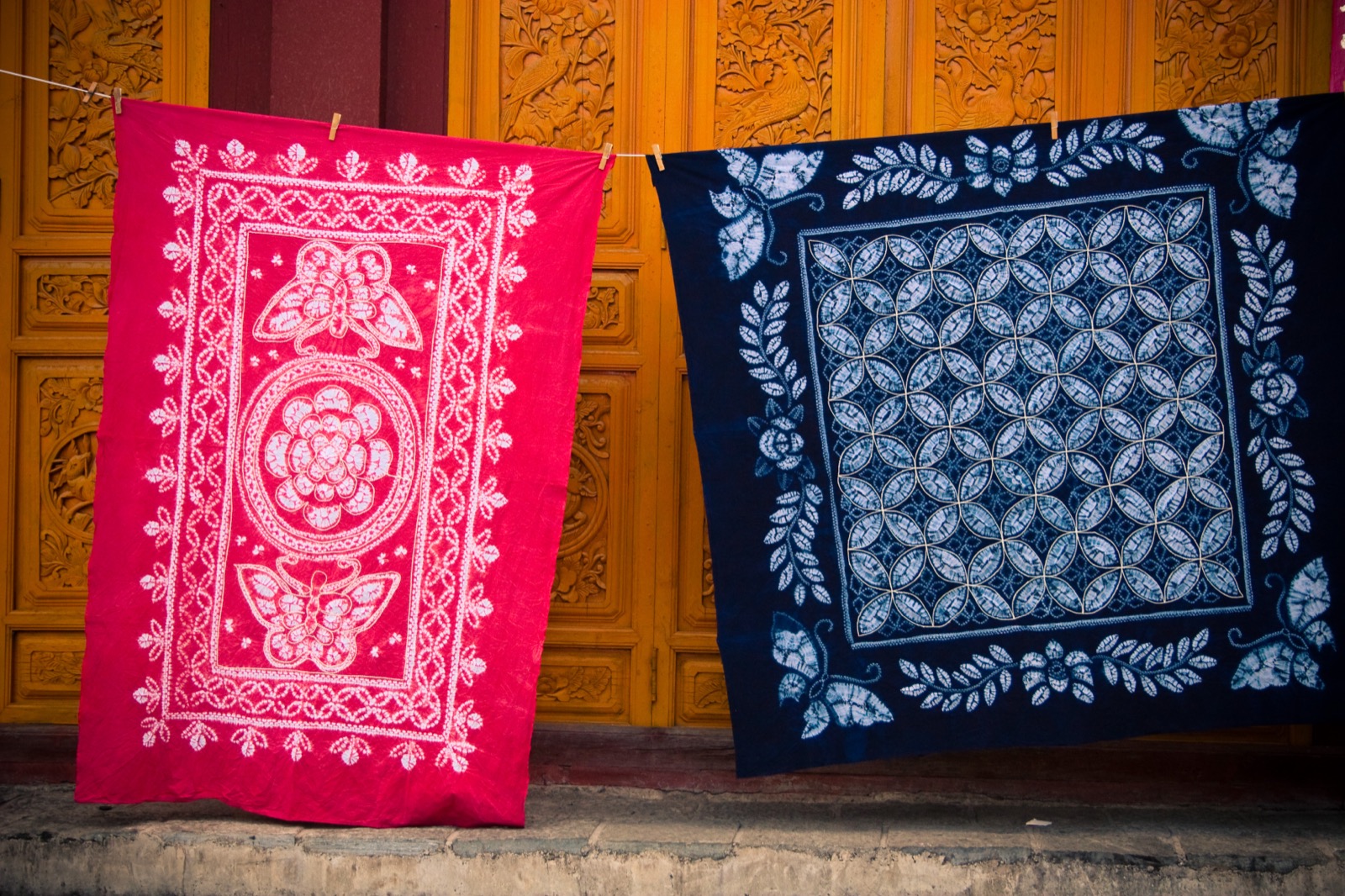 A Bai courtyard in Xizhou hung with indigo-and-white tie-dye cloth drying in the sun