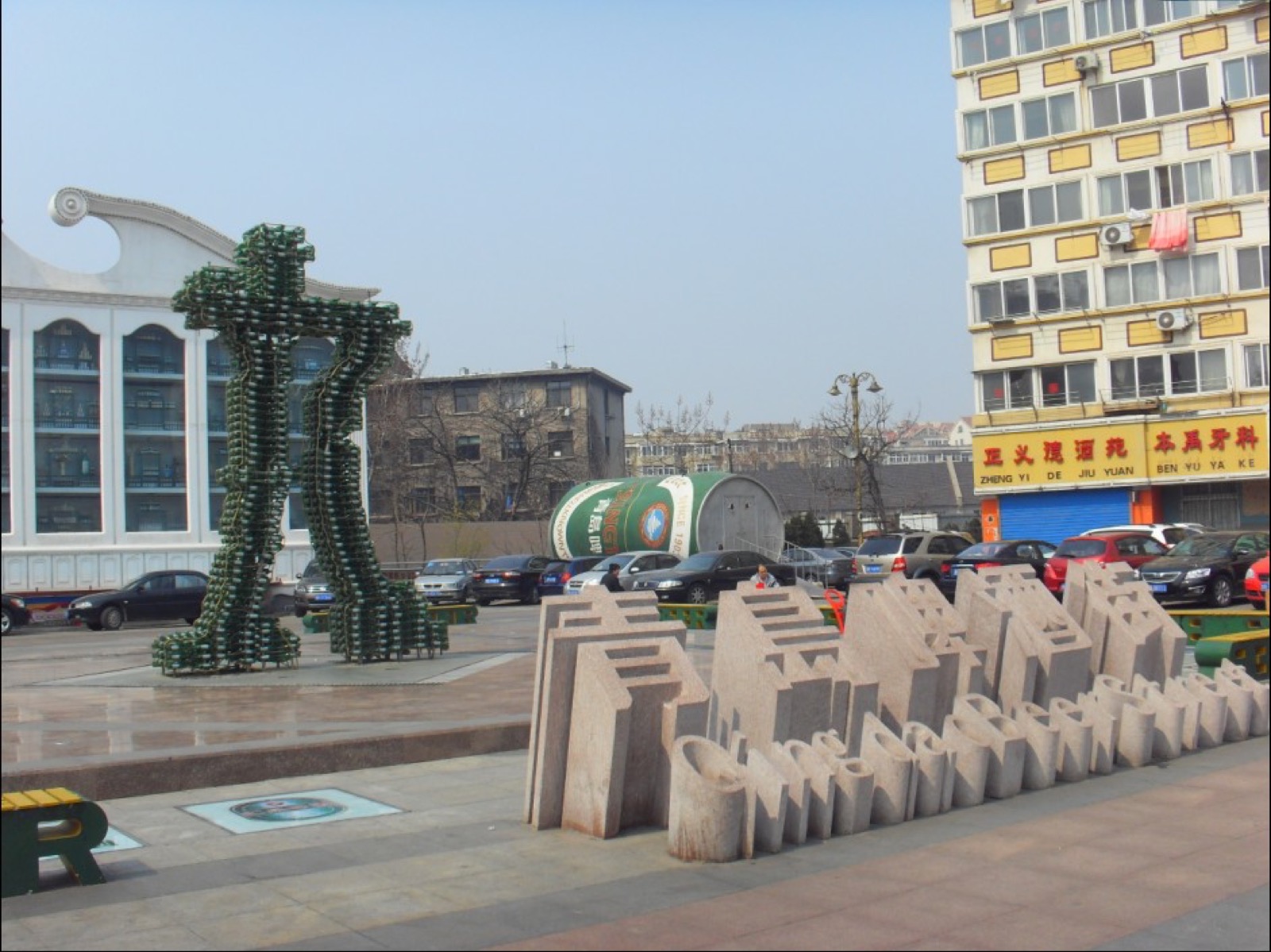 The Three Pagodas of Chongsheng Temple reflected in the still mirror pool, Cangshan rising behind