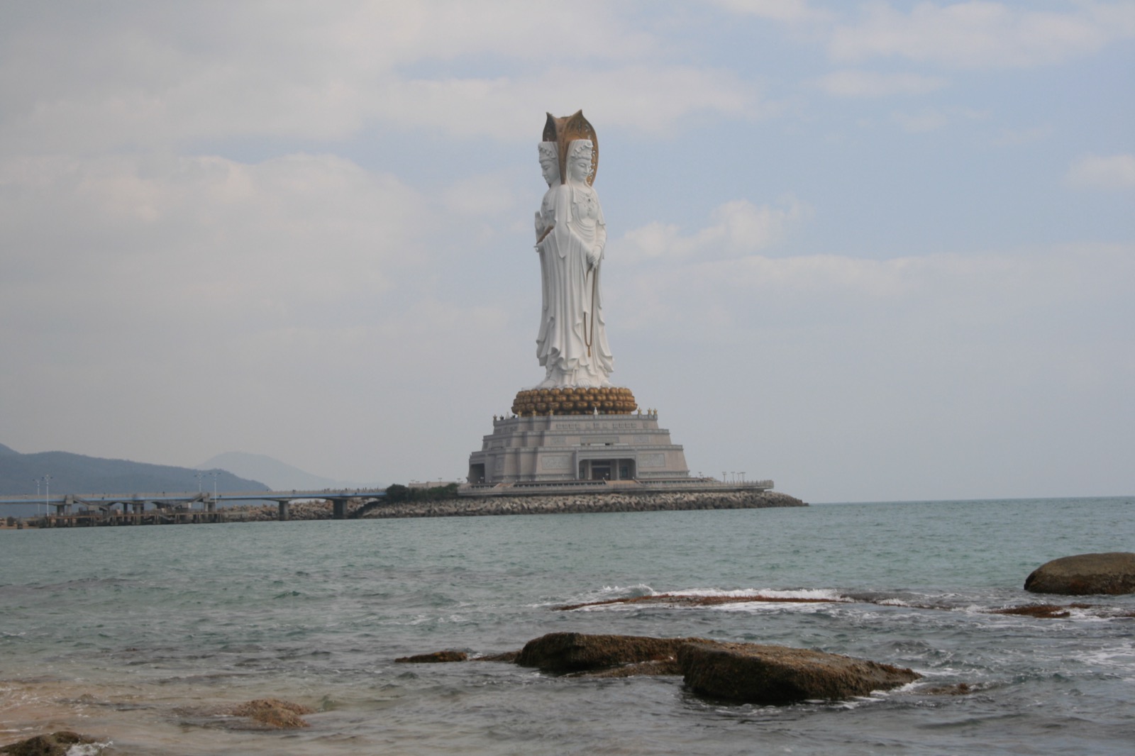 The 108-metre Guanyin of the South Sea statue rising from the water off Nanshan, three faces toward sea and land